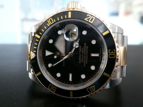 ROLEX SUBMARINER-DATE OR ET ACIER