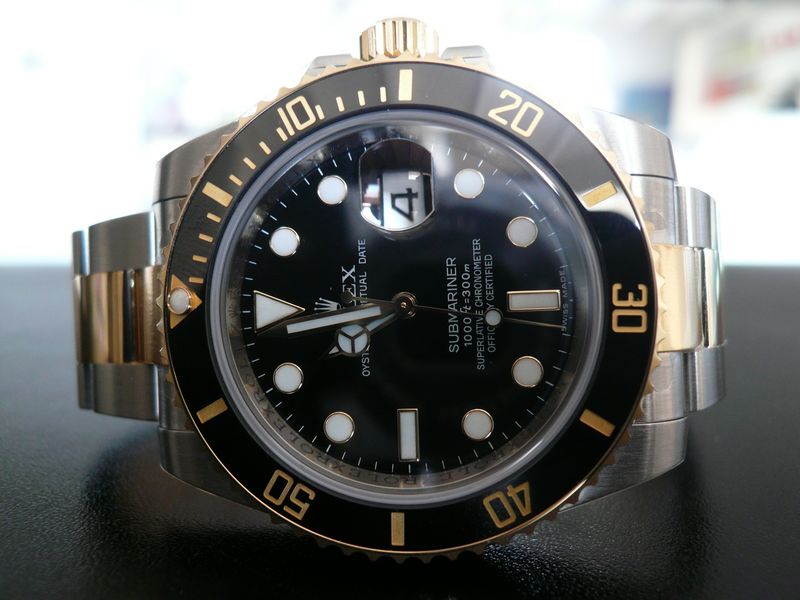 ROLEX SUBMARINER-DATE OR ET ACIER CERAMIQUE
 	 
