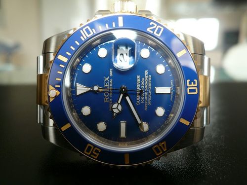 ROLEX SUBMARINER-DATE OR ET ACIER CERAMIQUE