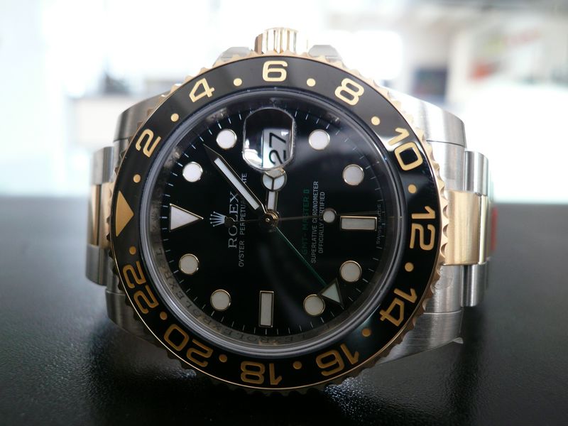 ROLEX GMT MASTER II CERAMIQUE OR ET ACIER
 	 
