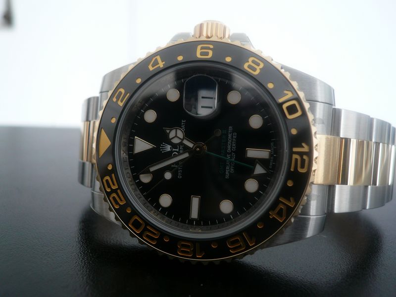 ROLEX GMT MASTER II CERAMIQUE OR ET ACIER
 	 
