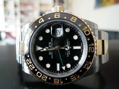 ROLEX GMT MASTER II OR ET ACIER LUNETTE CERAMIQUE