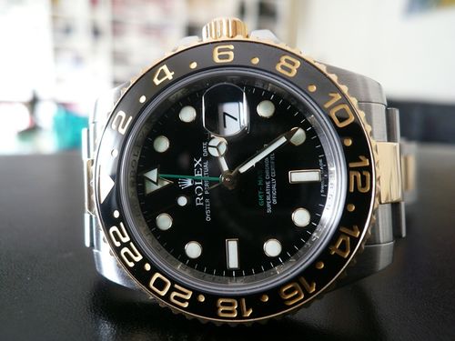 ROLEX GMT MASTER II OR ET ACIER LUNETTE CERAMIQUE